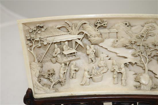 A fine Chinese ivory fan-shaped panel, late 19th/early 20th century,